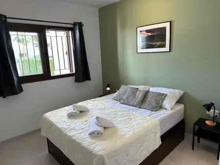 Appartement moderne près de la plage, climatisé, 2 chambres, avec jardin commun : photo 13