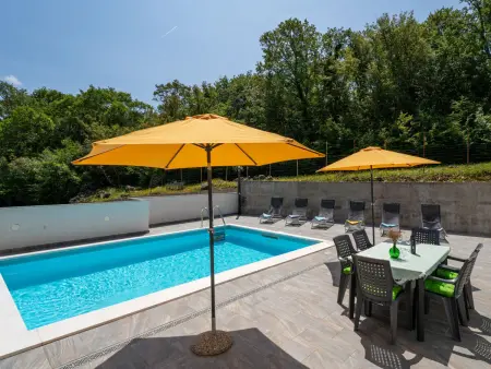 Maison Fanuko avec piscine privée à Malinska : photo 5