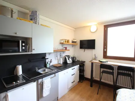 Location appartement à Chamrousse, Studio cosy 19m² au pied des pistes avec piscine