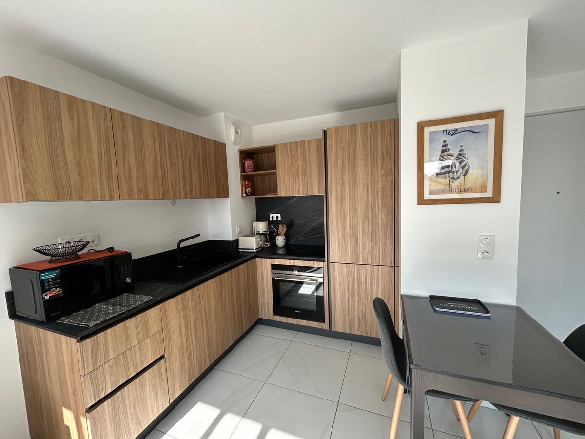Appartement 40m² neuf à 150m de la plage, parking couvert - Photo 6
