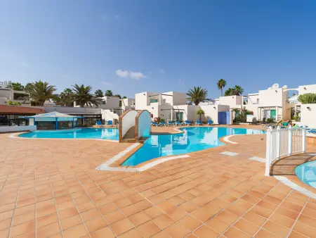 Location appartement à Corralejo, Appartement rénové avec piscine commune à Corralejo