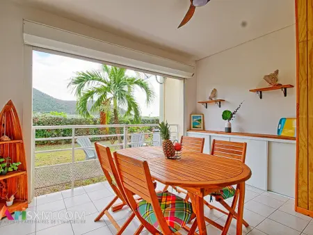 Location appartement à Saint Martin , Appartement cosy à Grand Case avec terrasse, parking sécurisé et Wi-Fi