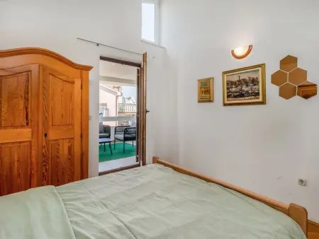 Maison Karlo avec piscine privée à Malinska : photo 17