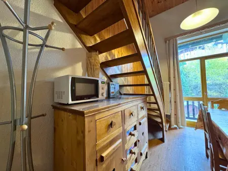 Duplex en mezzanine pour 6, pieds dans la neige aux Menuires : photo 6