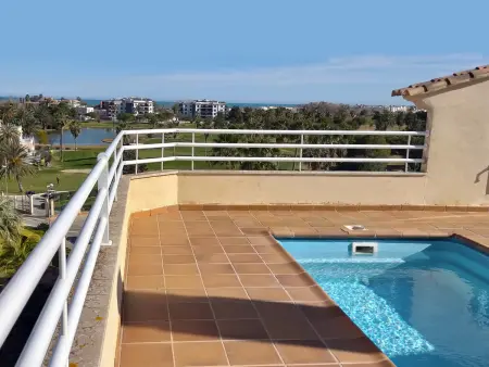 Location appartement à Oliva, Appartement spacieux 3 chambres avec solarium privé et piscine à Oliva Nova