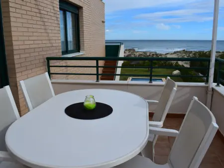 Location appartement à Oliva, Charmante maison à 25m de la plage avec piscine commune, idéale pour 4 personnes à Oliva