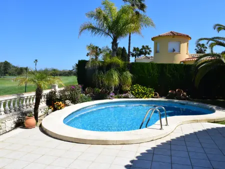 Location villa à Oliva, Chalet Luxueux à Oliva Nova Golf avec Jardin et Confort Moderne
