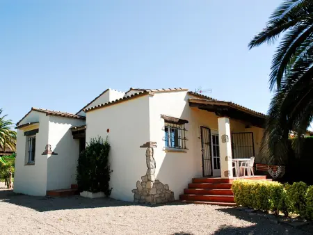 Location maison à L'Estartit, Maison familiale à LEstartit avec piscine commune et jardin, pour 4/5 personnes