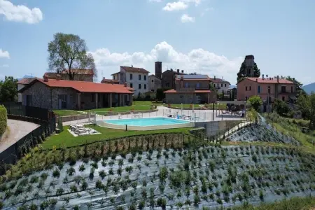 Location maison à Poppi, Appartement spacieux à Poppi avec piscine partagée