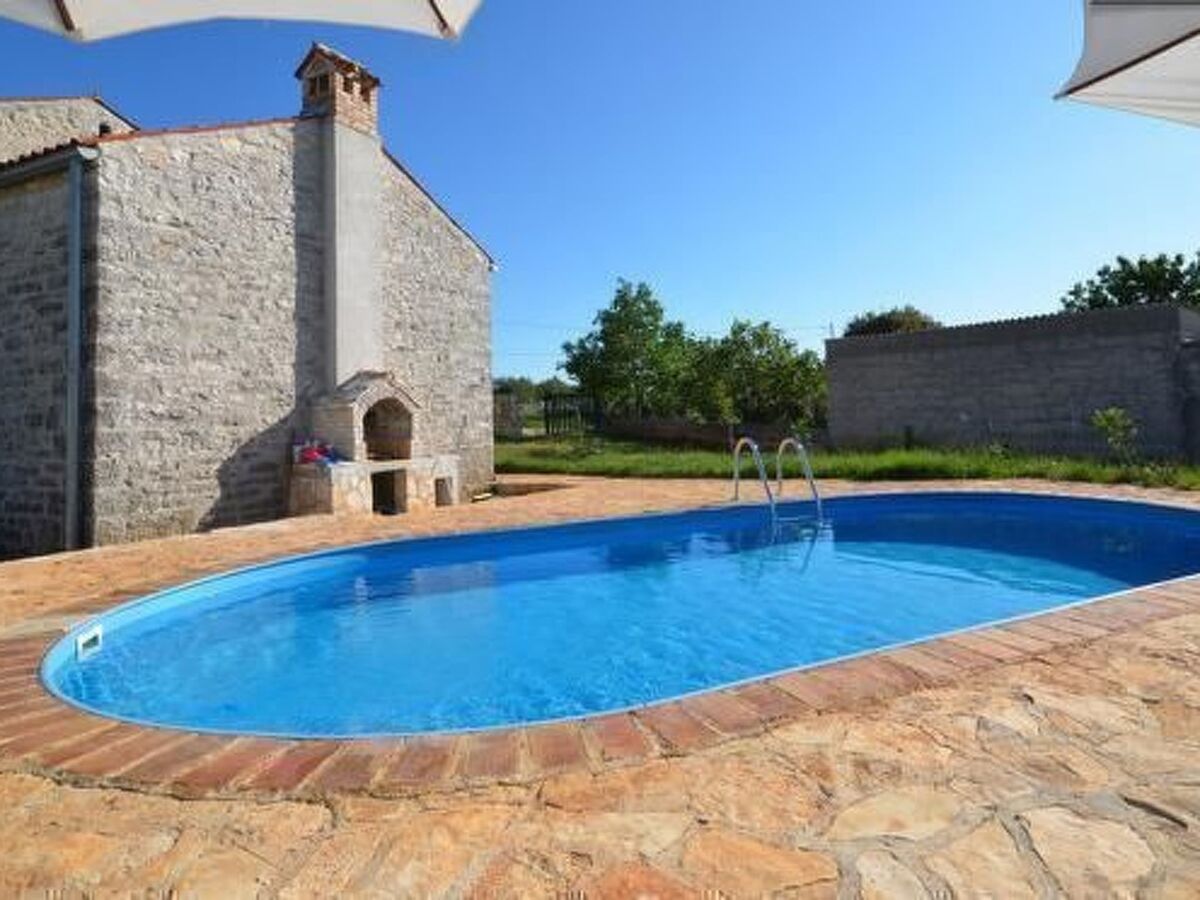 Maison en pierre avec piscine privée à Barban - Photo 8