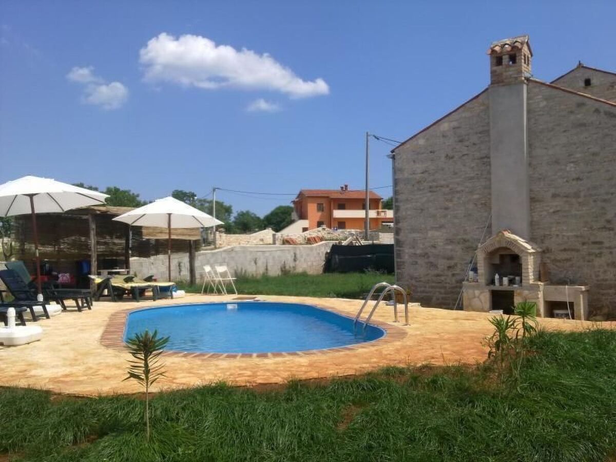 Maison en pierre avec piscine privée à Barban - Photo 9