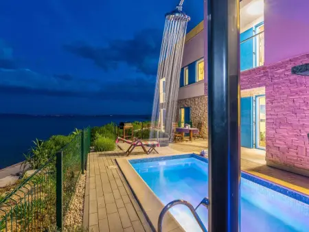 Villa beachfront 4 chambres avec piscine chauffée