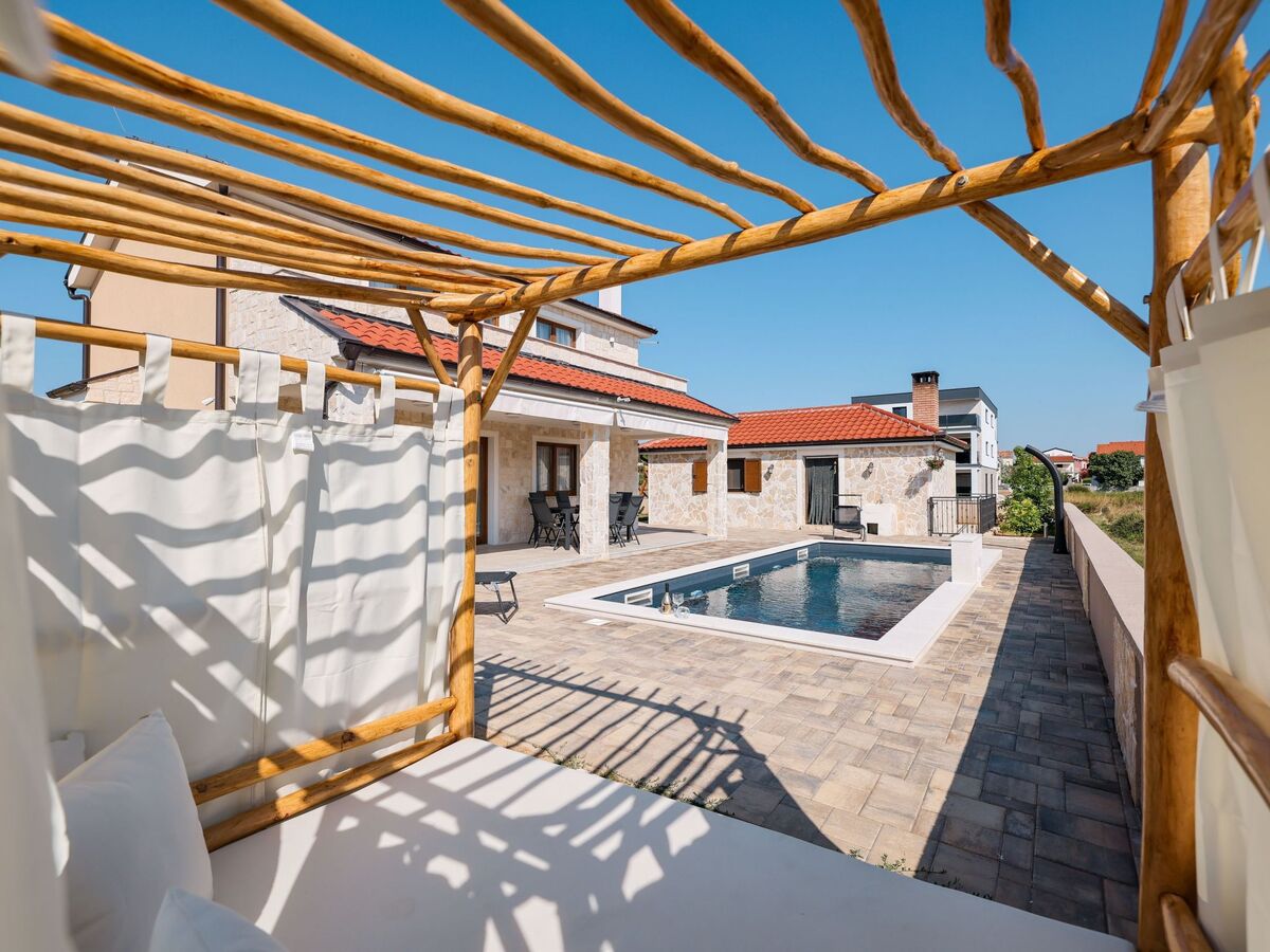 Villa neuve avec piscine chauffée à 150 m de la plage - Photo 18