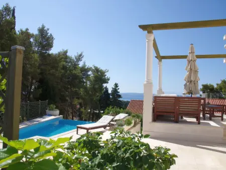 Maison pierre Sumartin, piscine à débordement vue mer : photo 7
