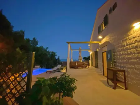 Maison pierre Sumartin, piscine à débordement vue mer : photo 34