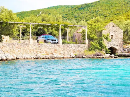 Maison avec plage privée à Putniković : photo 15