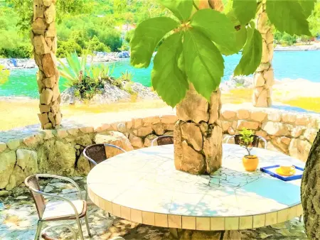 Maison avec plage privée à Putniković : photo 34