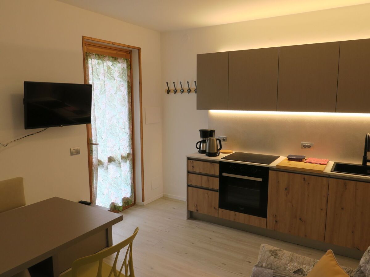 Appartement rez-de-chaussée avec jardin privé à Bezzecca - Photo 5