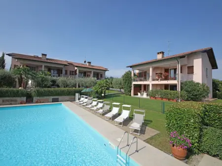 Location appartement à Manerba, Geranium Wohnung mit Schwimmbad
