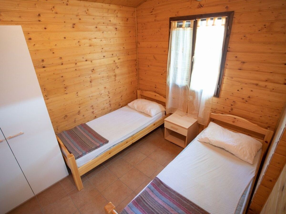 Bungalow en bois avec véranda, 800m de la plage - Photo 16