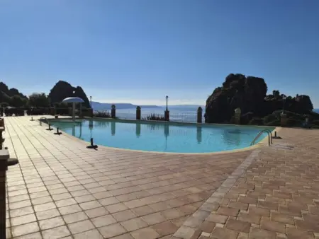 Location maison à Iglesias, Haus Red Coral mit Gemeinschaftspool