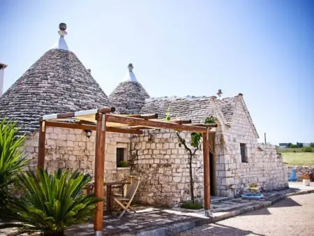Location maison à Martina Franca, Kirschbaum Trullo, Entspannung und Essen und Wein