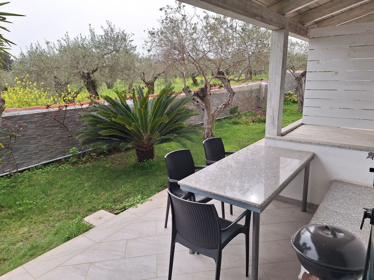 Appartement Mirto, terrasse vue oliveraie à Cala Liberotto - Photo 7
