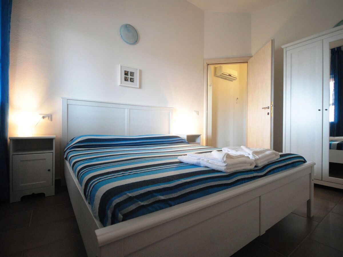 Azzurra – Appartement 2 chambres vue jardin à Cala Liberotto - Photo 5