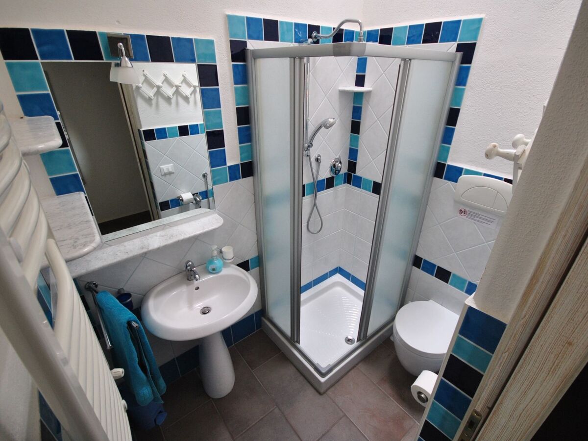 Azzurra – Appartement 2 chambres vue jardin à Cala Liberotto - Photo 11