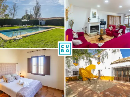 Location gite à Teba, Cortijo andalou à Teba avec piscine communautaire pour 15 pers.
