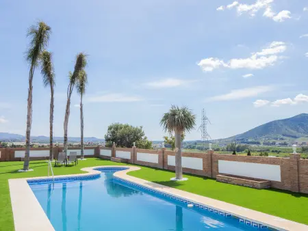 Location villa à Cártama, Grande villa avec piscine privée et jardin à Cártama
