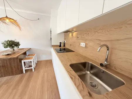 Charmant appartement rénové avec jardin, piscine et parking à L'Escala : photo 7