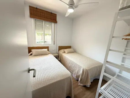 Charmant appartement rénové avec jardin, piscine et parking à L'Escala : photo 12