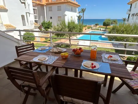 Location appartement à Denia, Appartement en bord de mer à Denia avec piscine, jardin et terrasse - 2 chambres, 2 salles de bains