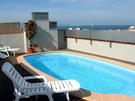 Location appartement à L'Escala, Appartement confortable à LEscala pour 6 pers avec piscine, clim, parking, proche plage et centre.
