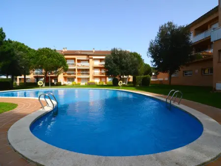 Location appartement à Pals, Appartement spacieux avec terrasse et piscine communautaire à Platja de Pals