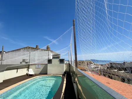 Location appartement à L'Escala, Appartement 6 pers à LEscala avec piscine commune, climatisation, parking et à 250m de la plage