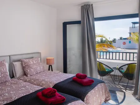 Maison 4 pers. Playa Blanca, terrasse vue mer et piscine : photo 13