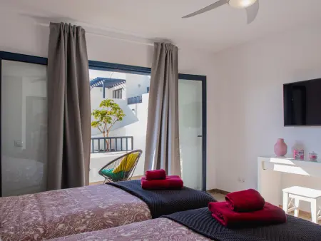 Maison 4 pers. Playa Blanca, terrasse vue mer et piscine : photo 19