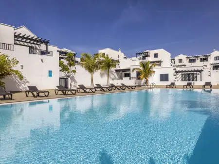 Location maison à Playa Blanca, Villa à Playa Blanca avec jardin spacieux et piscine partagée