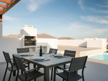 Villa 4 chambres Playa Blanca, piscine chauffée et jardin : photo 3