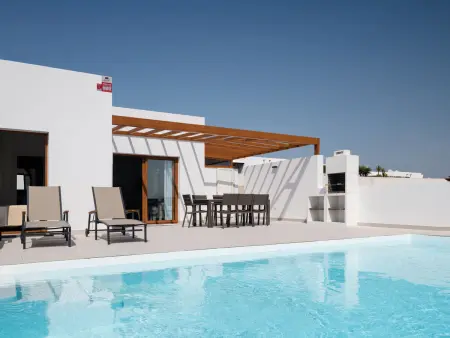 Villa 4 chambres Playa Blanca, piscine chauffée et jardin : photo 13