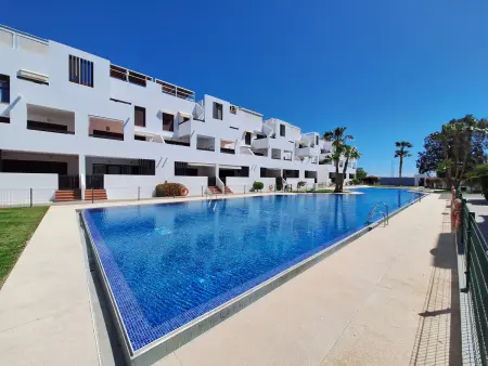 Location appartement à Playas de Vera, Appartement moderne près de la plage avec piscine, WiFi, parking et climatisation