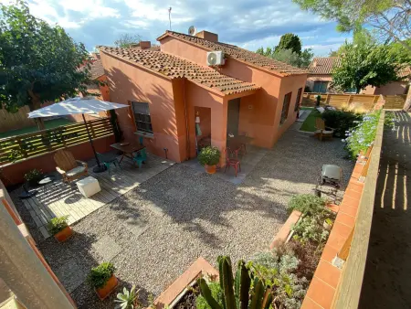 Location maison à Torroella de Montgrí, Villa à Torroella de Montgri pour 8, plage à 350m, piscine commune, clim, jardin et barbecue