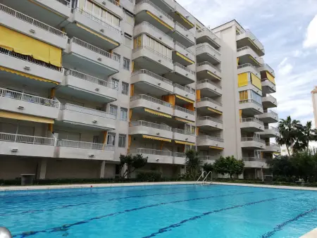Location appartement à Gandía, Appartement familial à Gandía avec terrasse et piscine, idéal pour 6/7 personnes