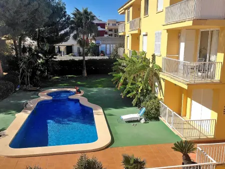 Location appartement à Can Picafort, Appartement moderne à Can Picafort avec WiFi et piscine