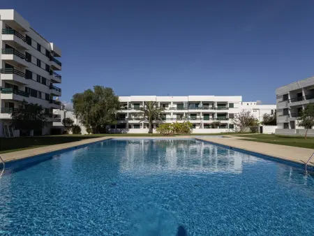 Location appartement à Quarteira Vilamoura, Appartement avec piscine commune et terrasse à Vilamoura