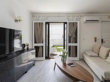 Location maison à Quarteira Vilamoura, Maison charmante avec jardin près de la marina à Vilamoura