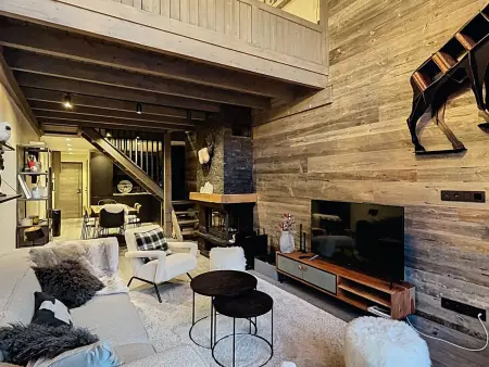 Location appartement à Méribel, Élégant triplex 4 pièces au cœur de Méribel avec parking sécurisé pour 7 personnes