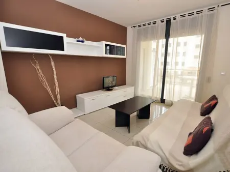 Location appartement à Roses, Appartement moderne à 50m de la plage avec piscine, climatisation et wifi